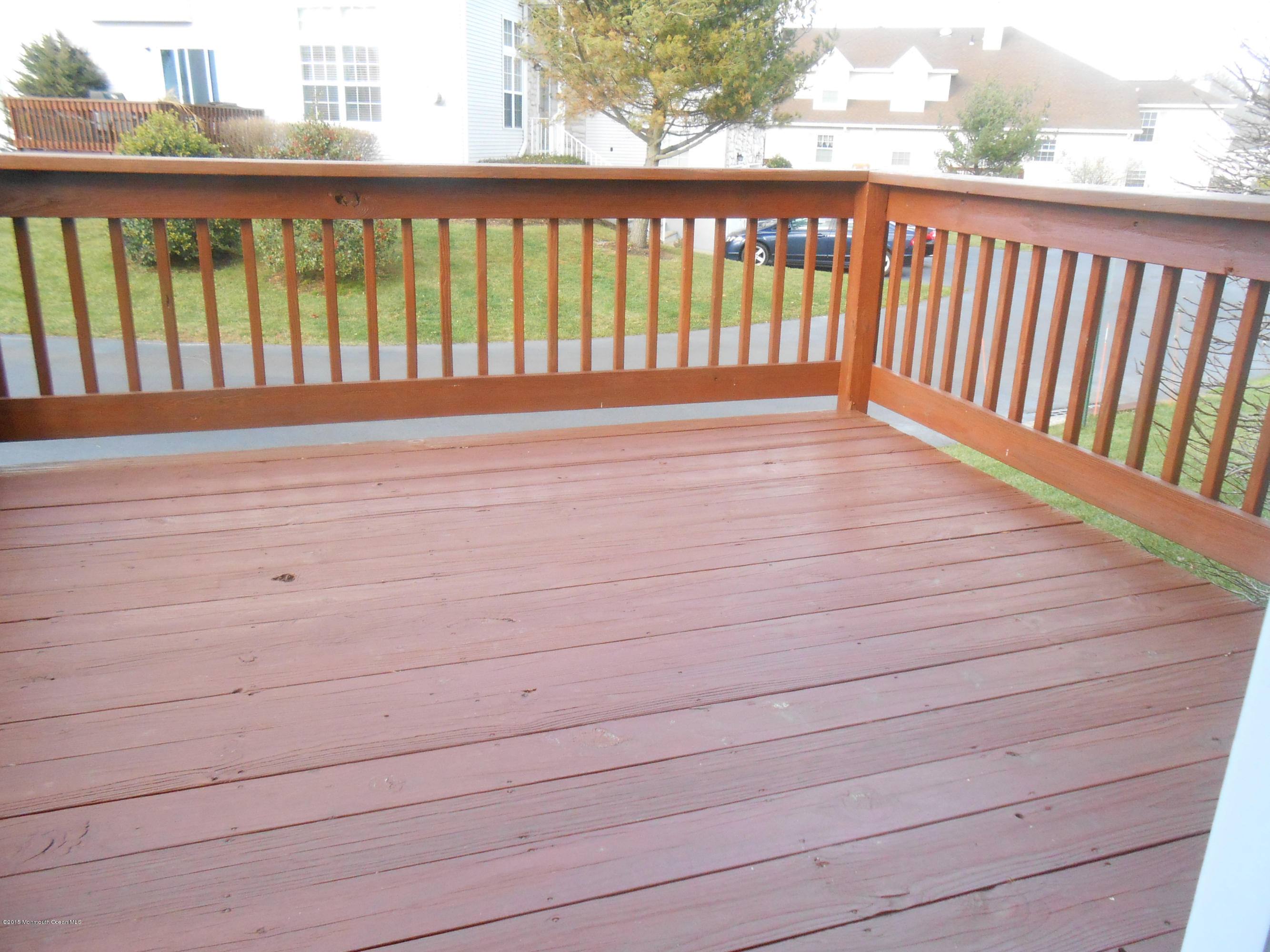 61 Racquet Road Wall, NJ 07719 - Photo 3 of 15 a view of wooden balcony