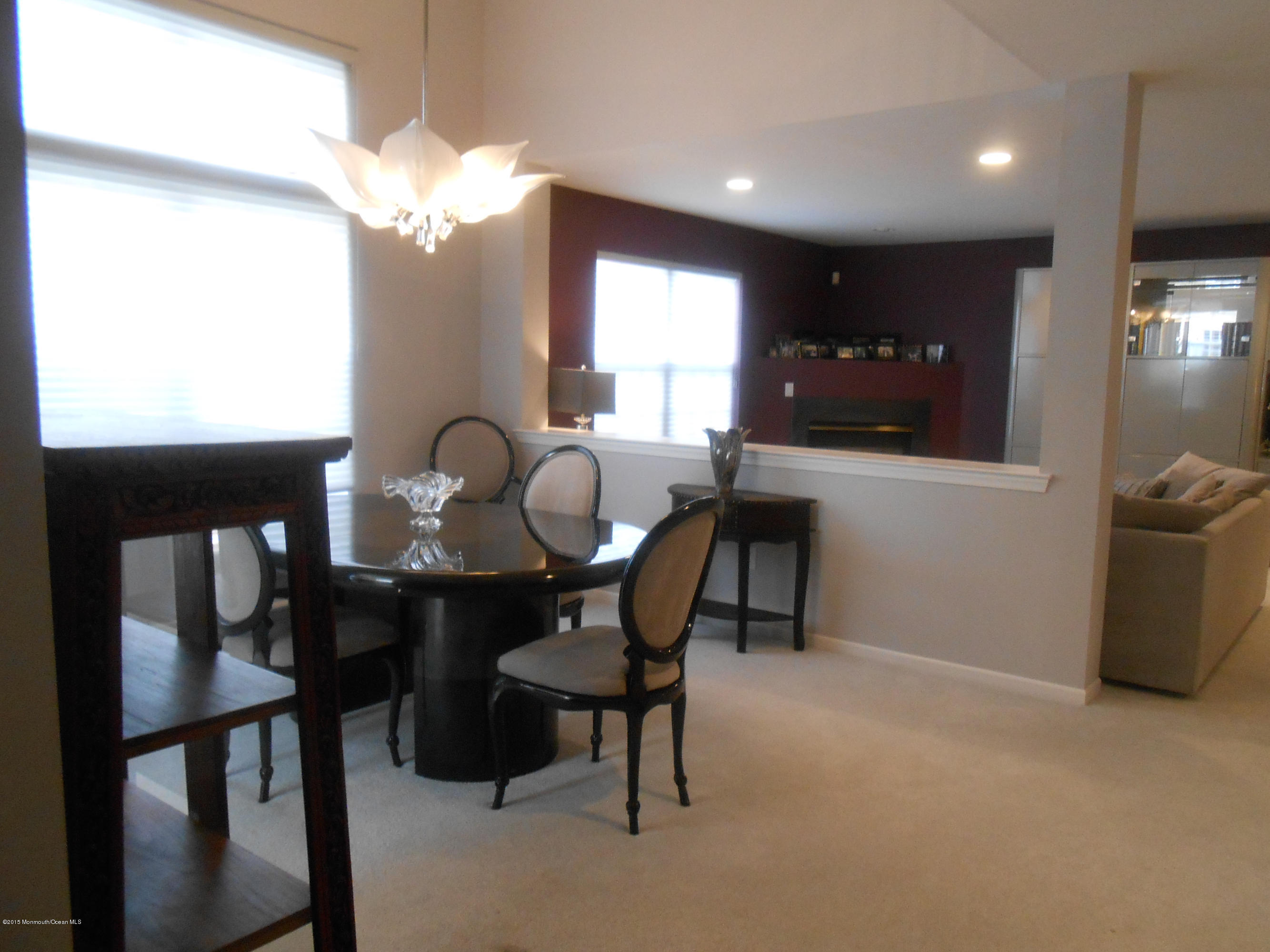 61 Racquet Road Wall, NJ 07719 - Photo 9 of 15 a view of a dining room with furniture and window