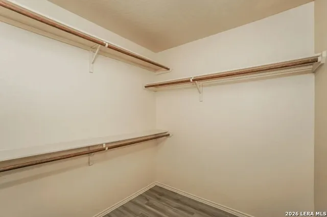 a view of a room with racks on the wall