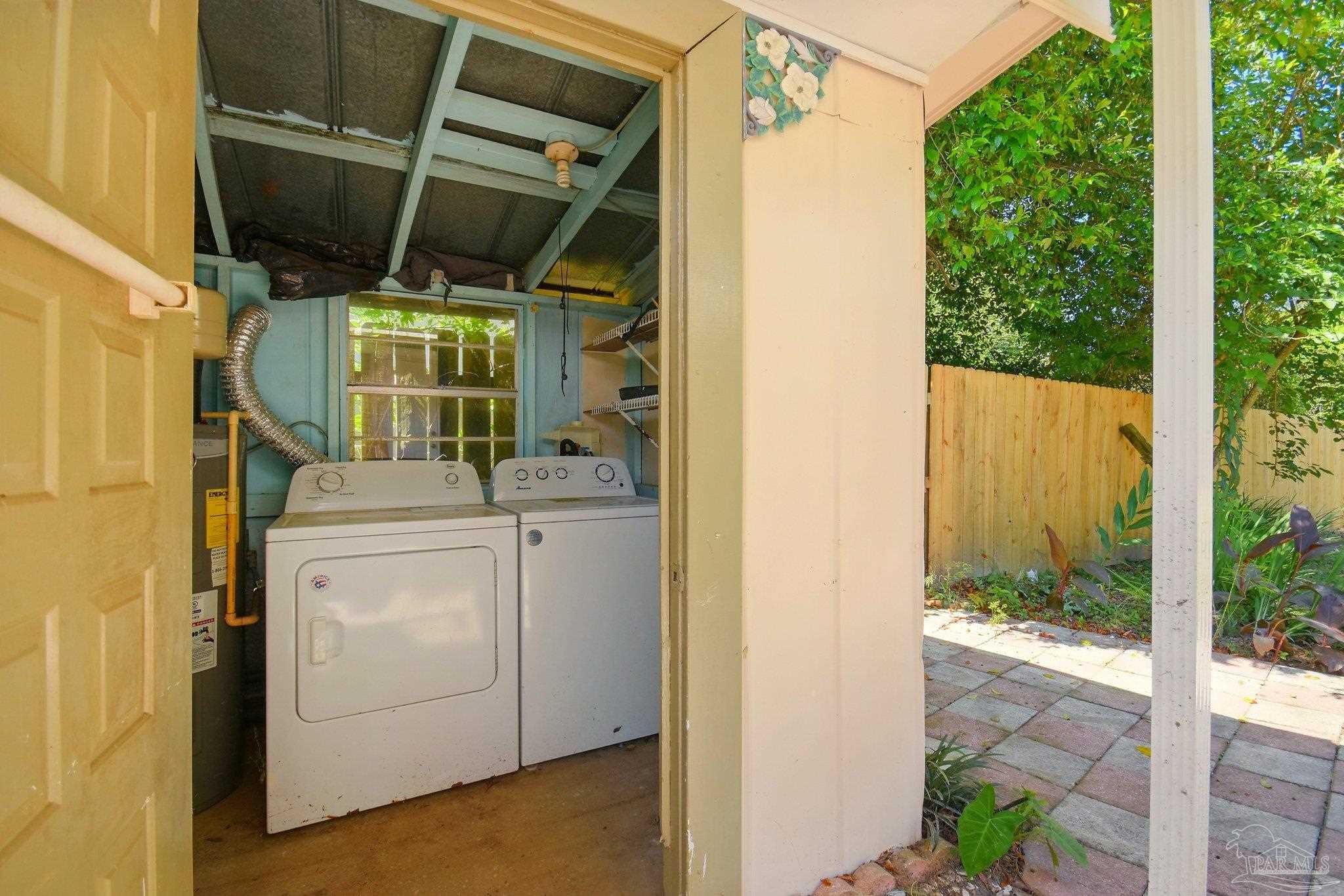 4329 Floridatown Road Pace, FL 32571 - Photo 28 of 32 a view of storage and utility room