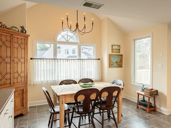 a kitchen with a sink stove and refrigerator