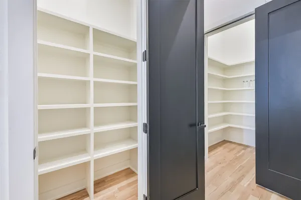 a view of an empty walk in closet