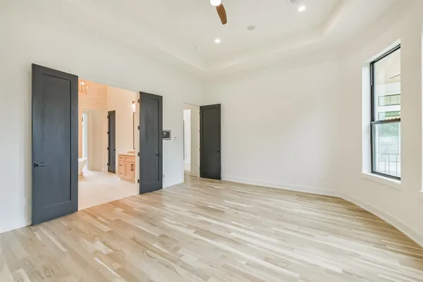 a kitchen with stainless steel appliances kitchen island granite countertop a sink and a stove