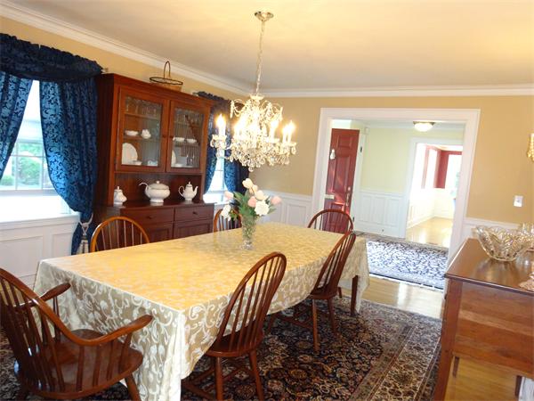 2 Allen Road Winchester, MA 01890 - Photo 5 of 25 a view of a dining room with furniture and window