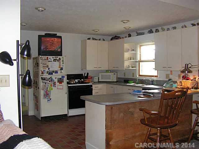2022 Lawyers Road Indian Trail, NC 28079 - Photo 3 of 3 a kitchen with stainless steel appliances granite countertop a stove a sink dishwasher and a refrigerator