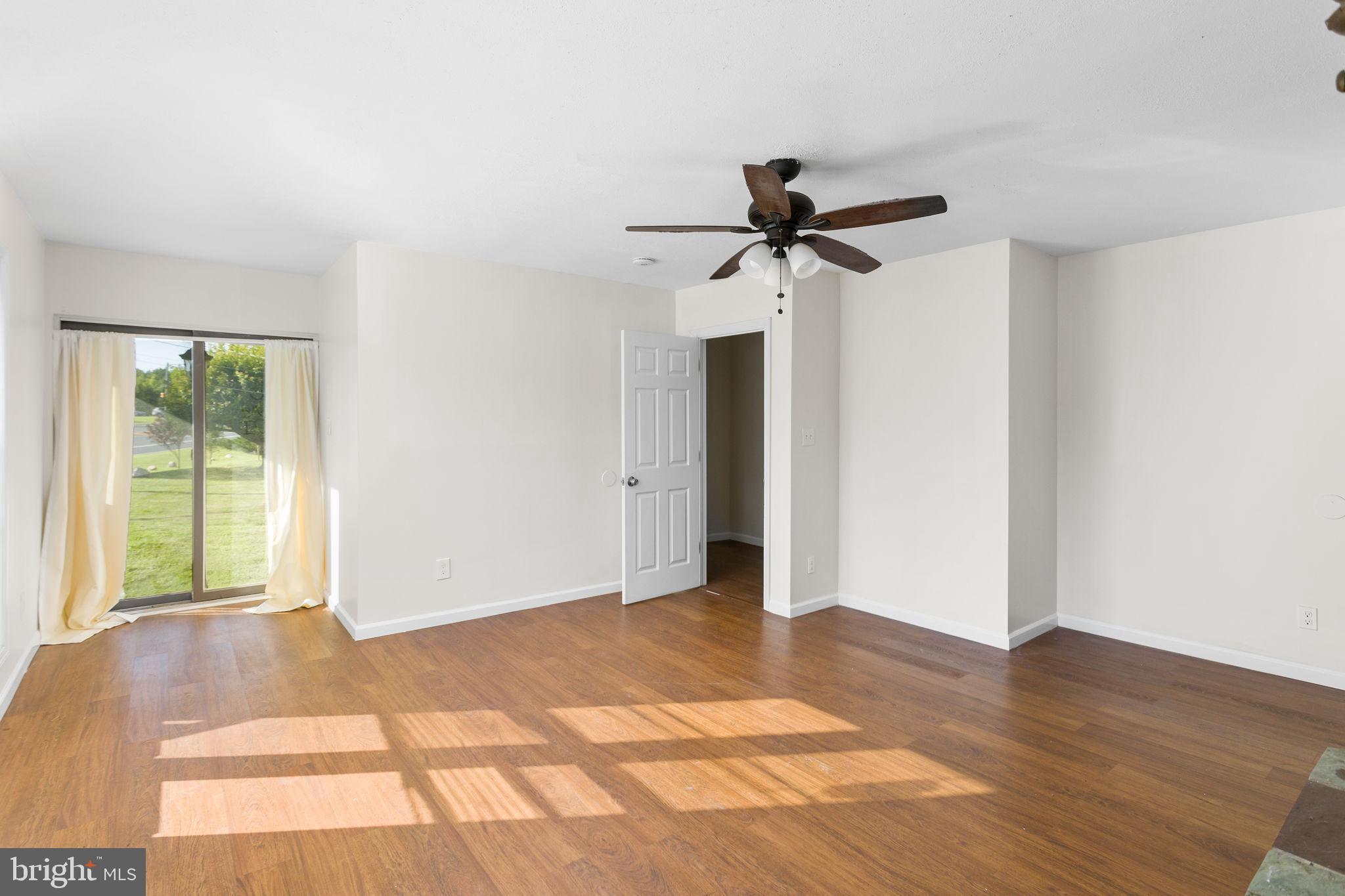 2264 Pennington Road Trenton, NJ 08638 - Photo 16 of 24 a view of room with a ceiling fan and window