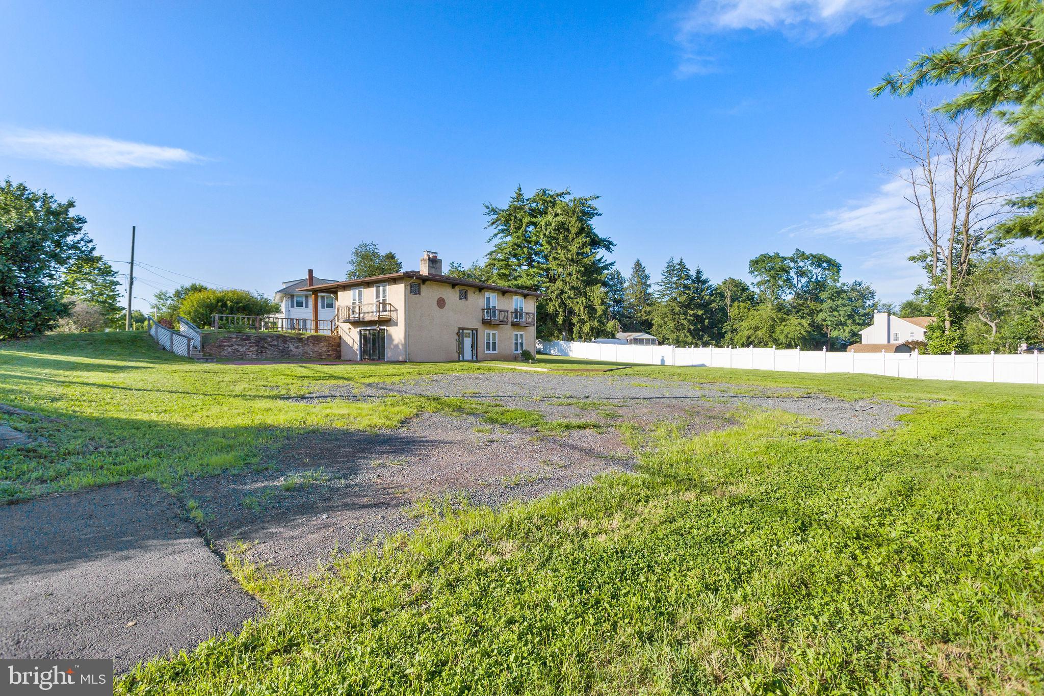 2264 Pennington Road Trenton, NJ 08638 - Photo 2 of 24 a view of a house with a big yard