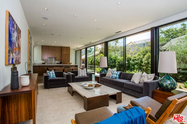 a view of a entryway with flower plants