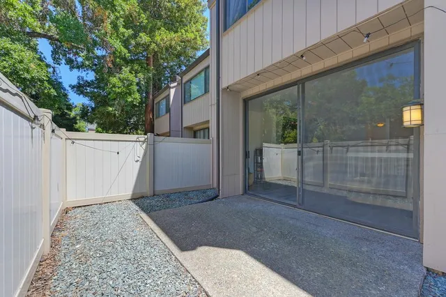 a picture of a bench in front of a wall