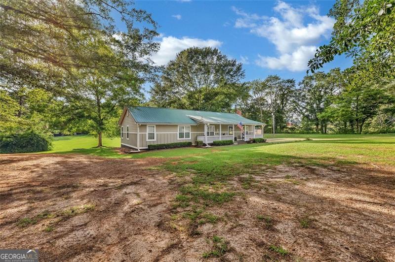 340 Tom Bell Road Milner, GA 30257 - Photo 3 of 34