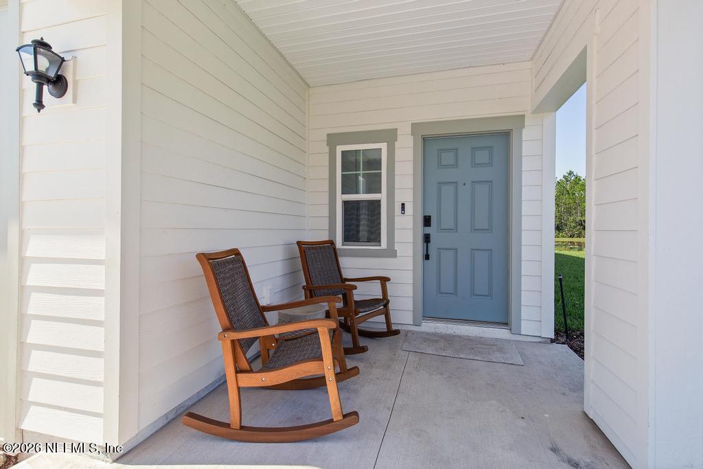 1353 Ribbon Place Palm Coast, FL 32164 - Photo 9 of 28 Amelia II - front entry