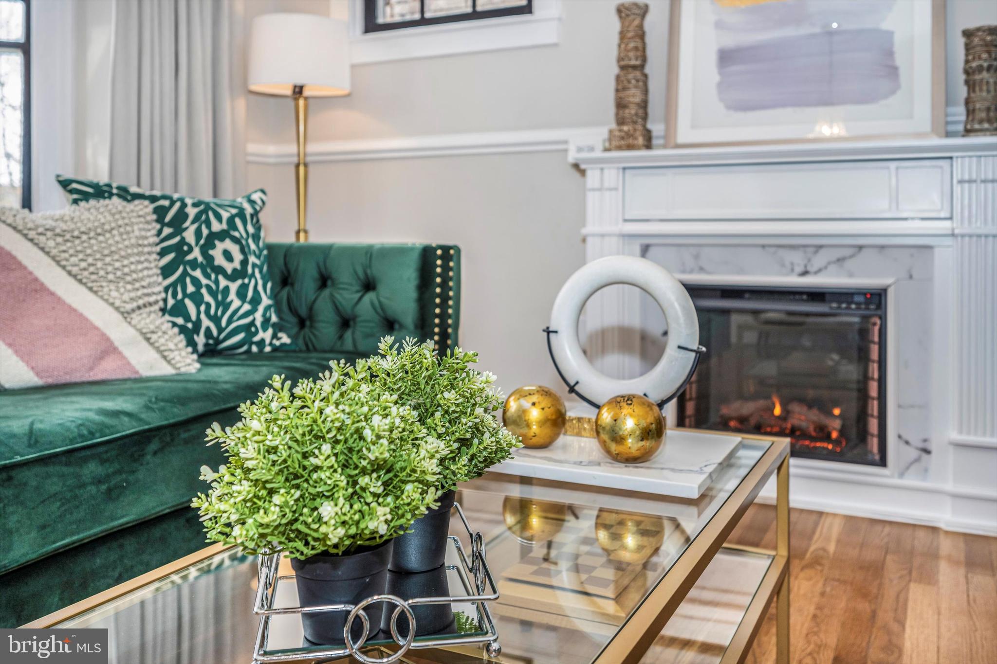 125 West Church Street, Unit B Frederick, MD 21701 - Photo 11 of 60 a kitchen with a stove and a wooden floor