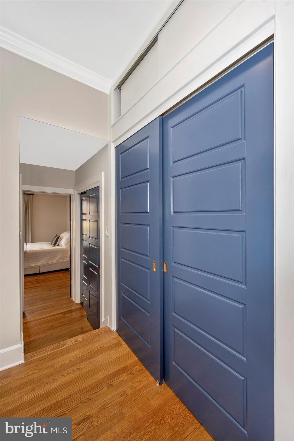 125 West Church Street, Unit B Frederick, MD 21701 - Photo 16 of 60 a bedroom with a bed and a dresser