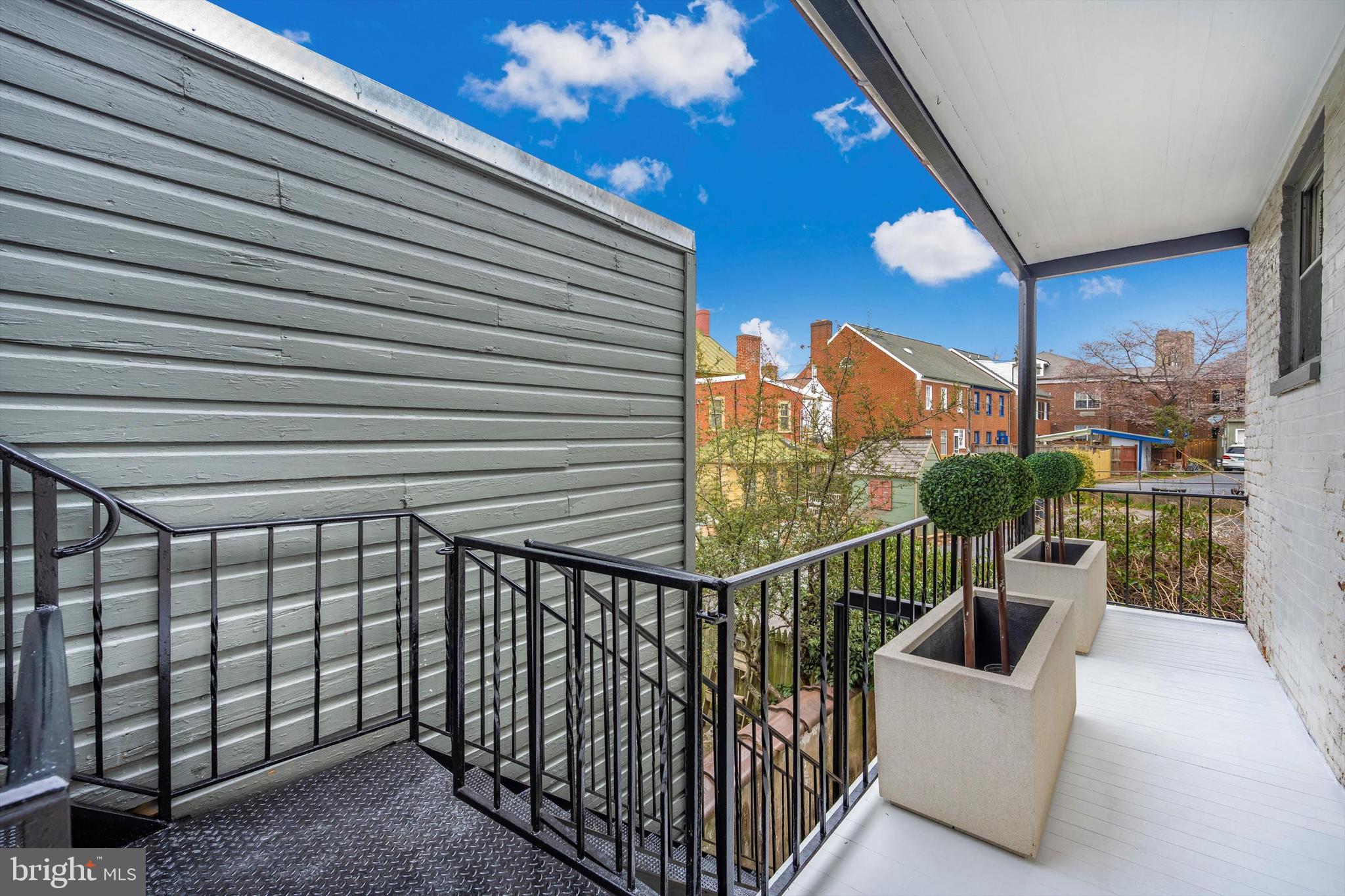 125 West Church Street, Unit B Frederick, MD 21701 - Photo 43 of 60 a view of a balcony with furniture