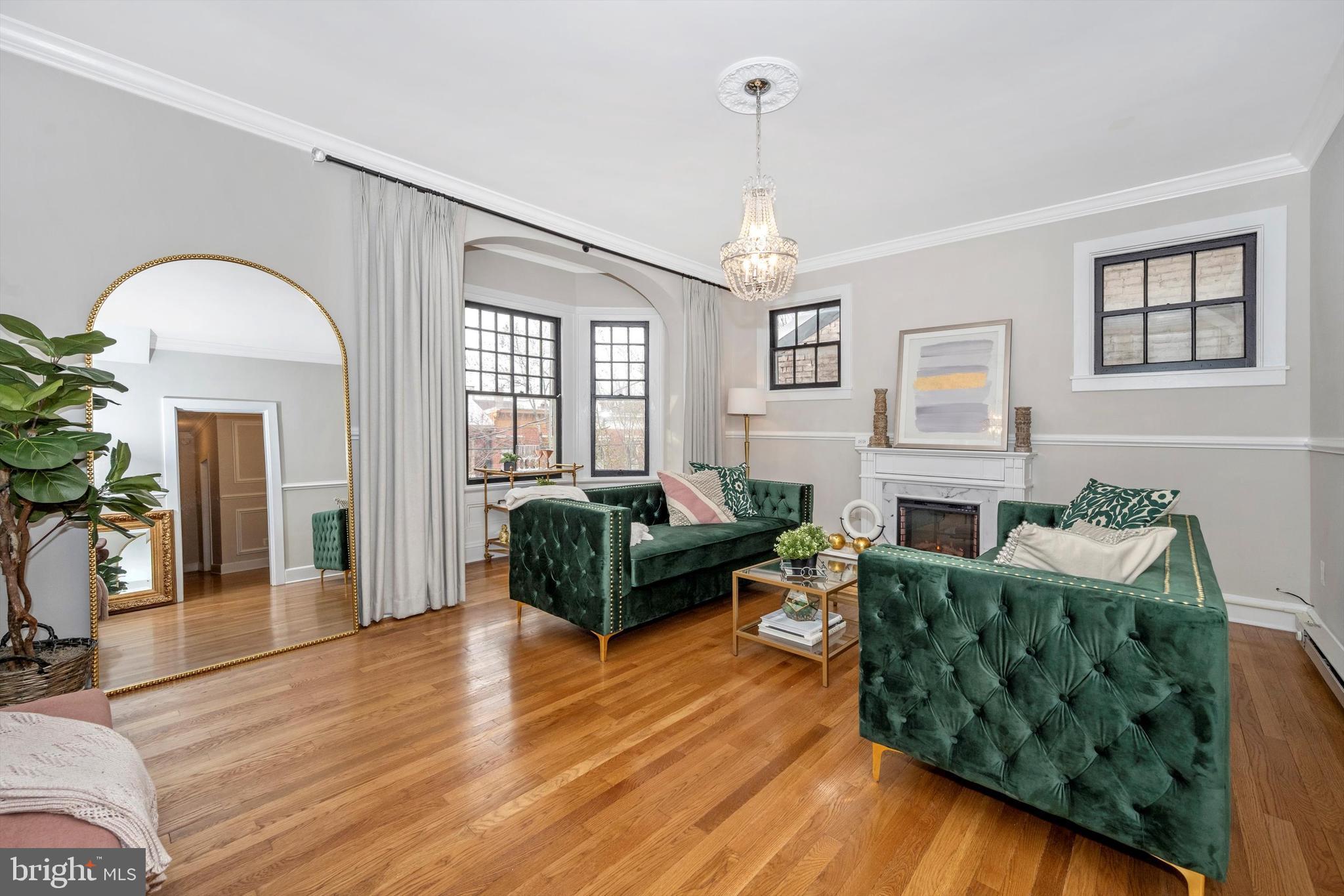 125 West Church Street, Unit B Frederick, MD 21701 - Photo 8 of 60 a living room with furniture and a fireplace