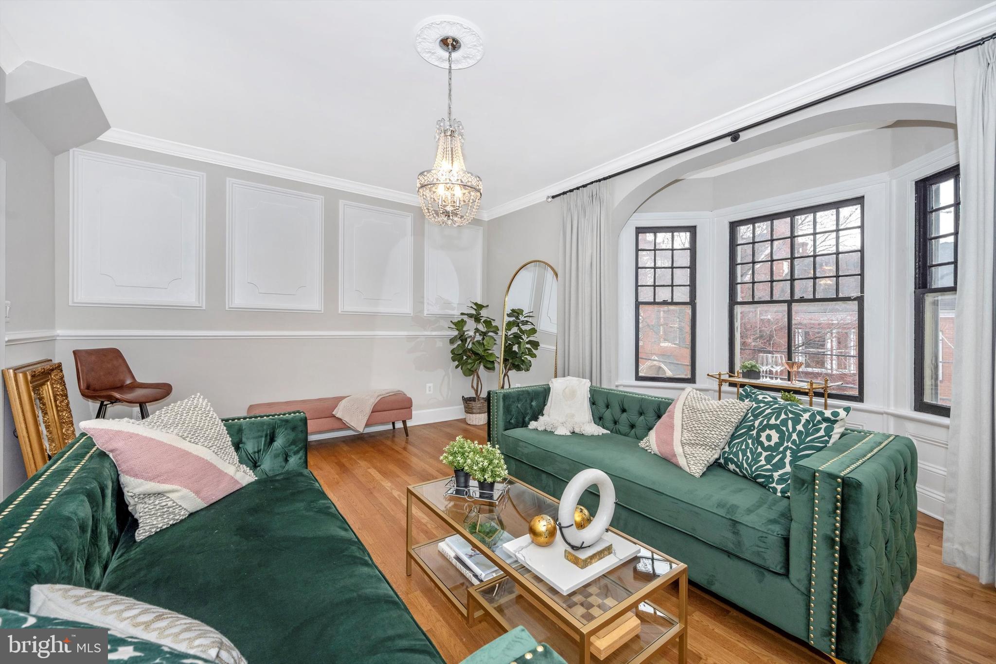 125 West Church Street, Unit B Frederick, MD 21701 - Photo 9 of 60 a living room with furniture and a chandelier