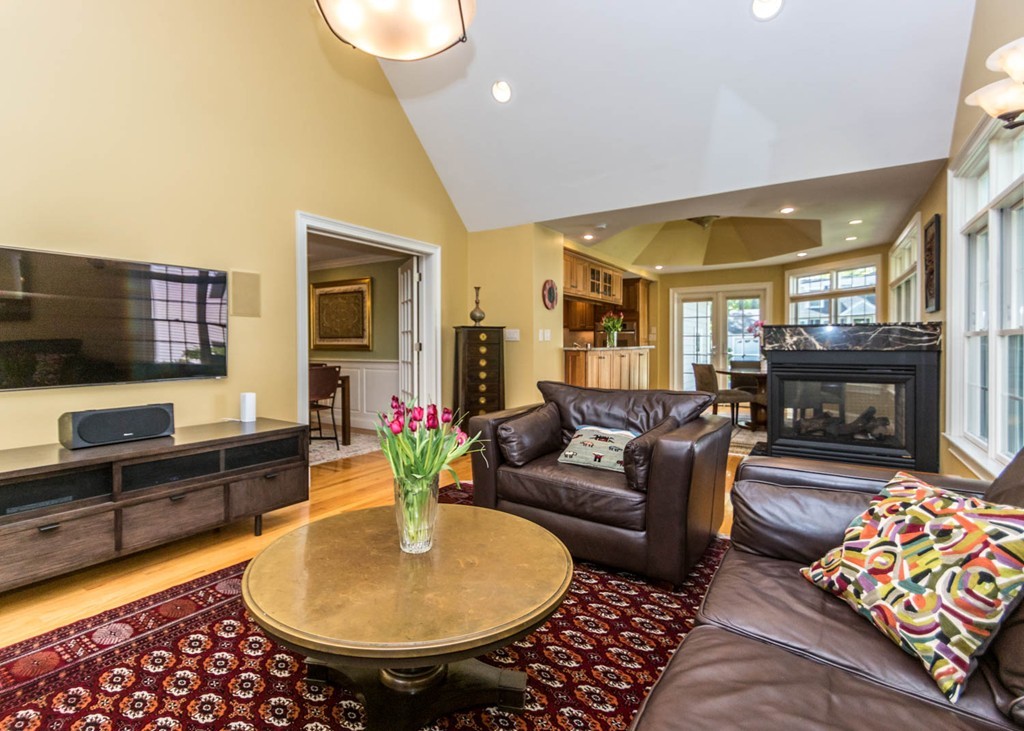 65 Avalon Road Needham, MA 02492 - Photo 11 of 30 a living room with furniture and a fireplace
