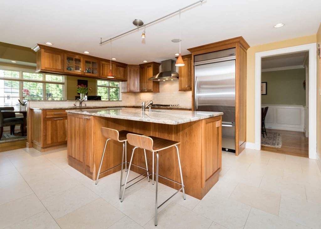 65 Avalon Road Needham, MA 02492 - Photo 14 of 30 a kitchen with stainless steel appliances granite countertop a sink and a refrigerator