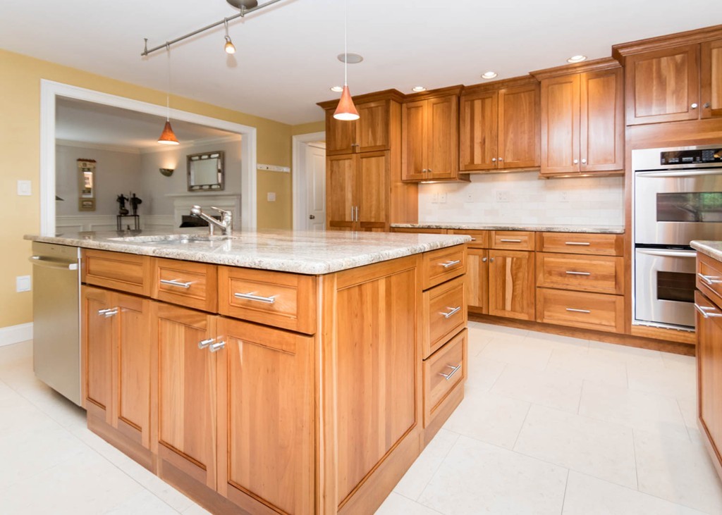 65 Avalon Road Needham, MA 02492 - Photo 15 of 30 a kitchen with stainless steel appliances granite countertop a sink and cabinets