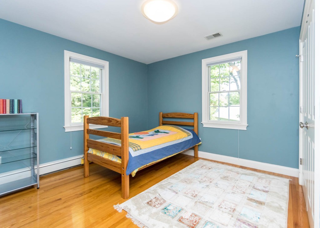 65 Avalon Road Needham, MA 02492 - Photo 20 of 30 a bedroom with a bed and a window