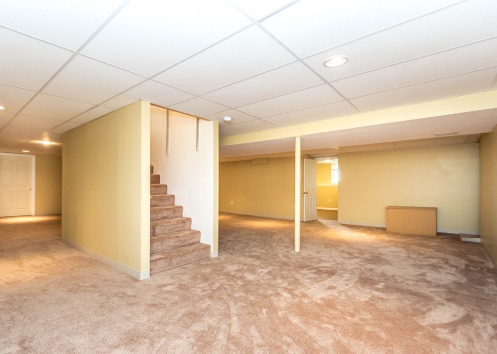 65 Avalon Road Needham, MA 02492 - Photo 24 of 30 a view of a livingroom with an empty space