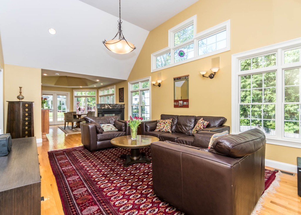 65 Avalon Road Needham, MA 02492 - Photo 10 of 30 a living room with lots of furniture and a large window