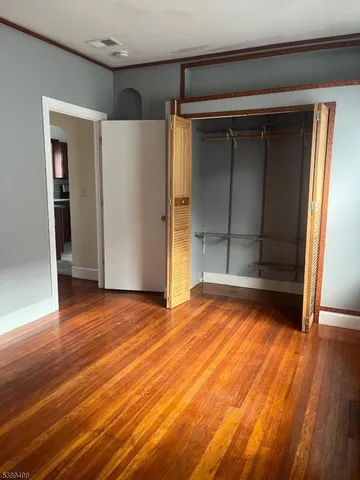 a kitchen with granite countertop a stove and a microwave