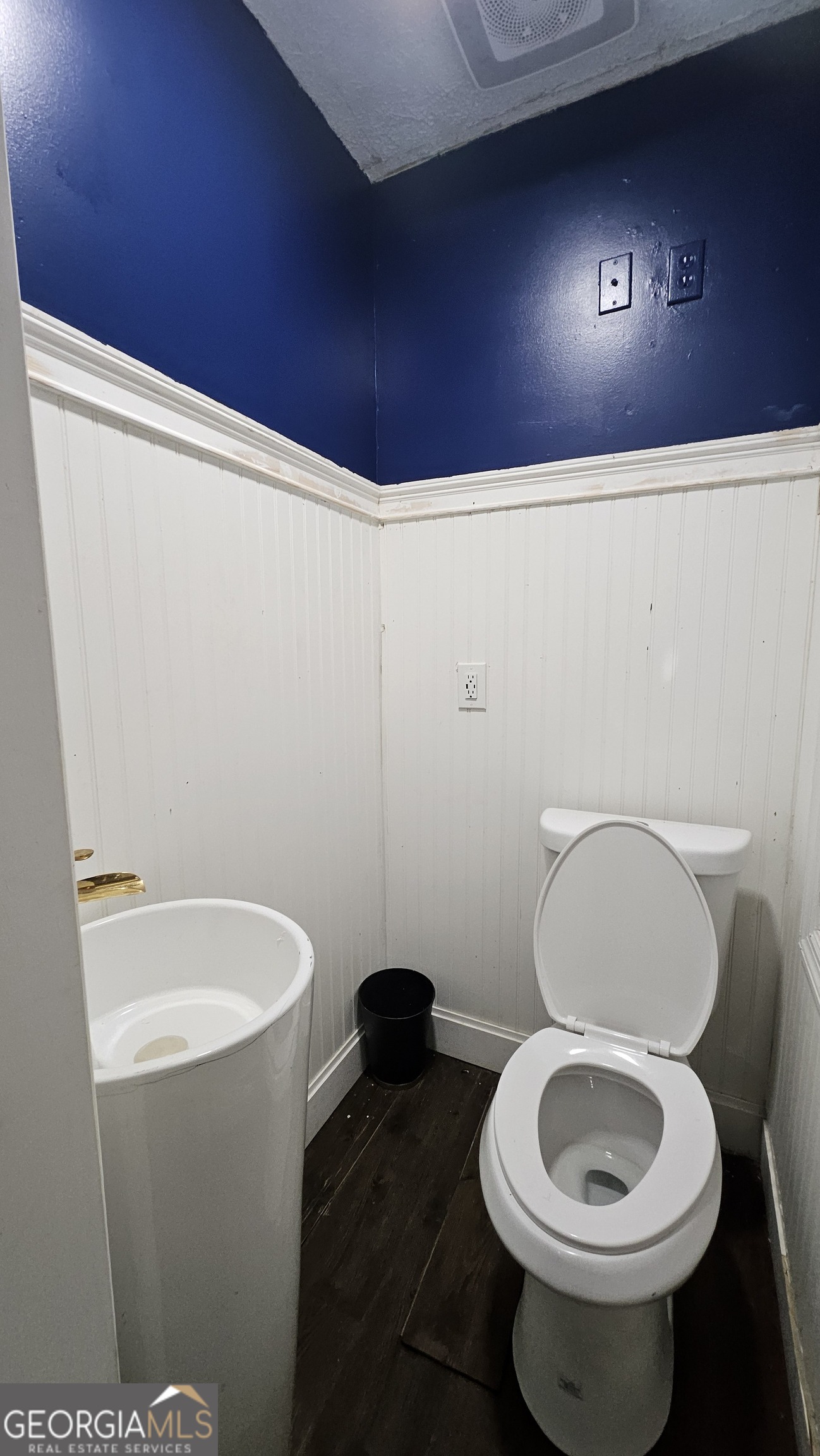 2197 Polar Rock Place Southwest Atlanta, GA 30315 - Photo 4 of 9 a white toilet sitting next to a small bathroom