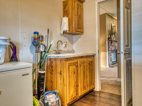 6341 Farm Private Road Levelland, TX 79336 - Photo 33 of 46 a view of walk in closet with clothes