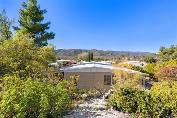 a view of a lake with a building in the background