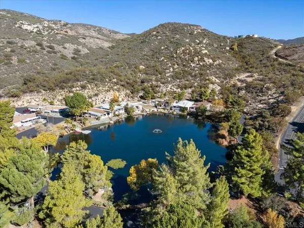 a view of a houses with a lake
