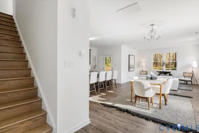 a view of a livingroom with furniture and lounge chair