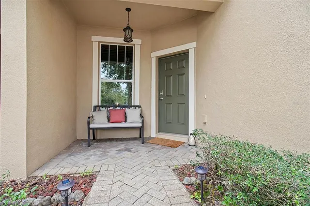 a bedroom with bed and window