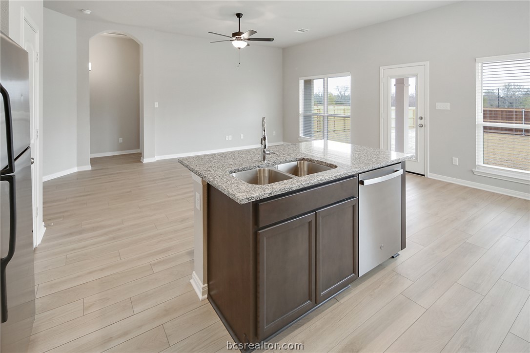 10603 Natural Pond Road College Station, TX 77845 - Photo 13 of 33 Kitchen and living room