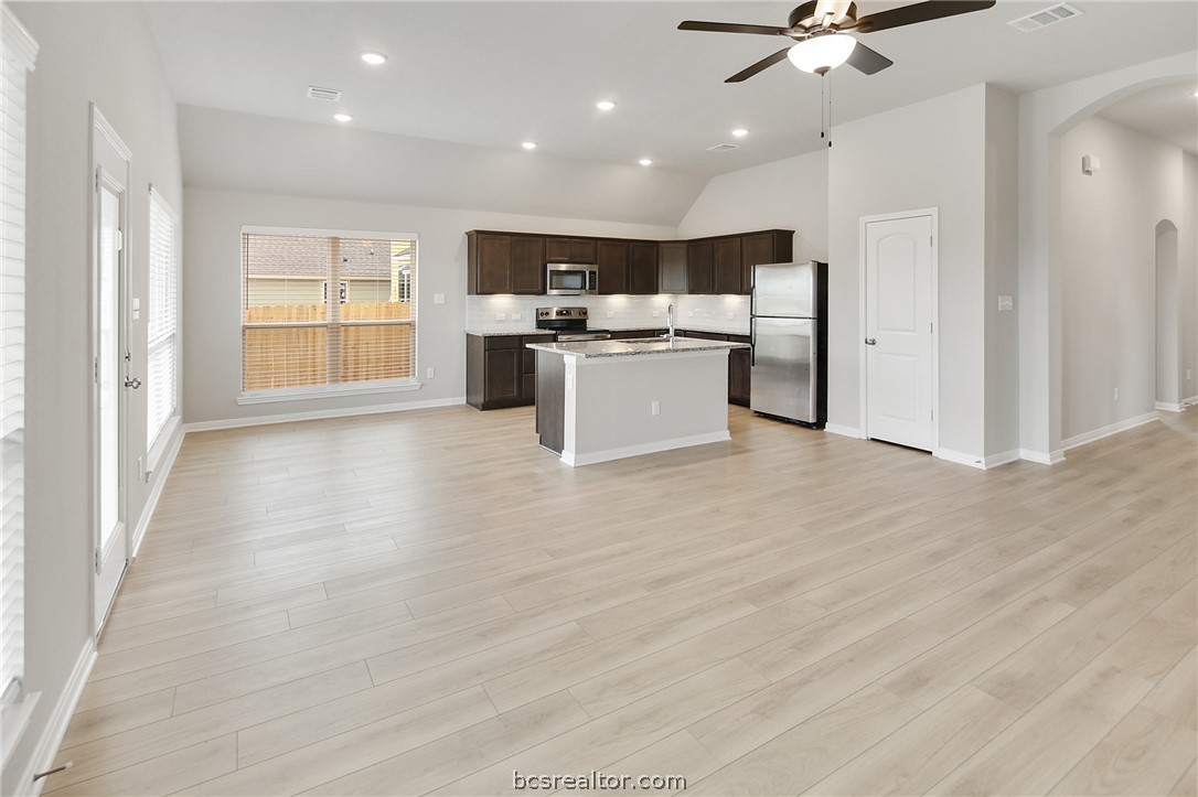 10603 Natural Pond Road College Station, TX 77845 - Photo 5 of 33 view of kitchen and dining from living room