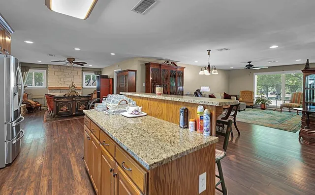 a front view of a house with parking space