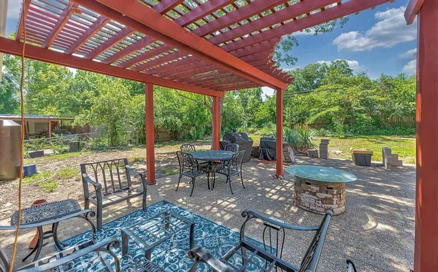 a room with furniture and a flat screen tv