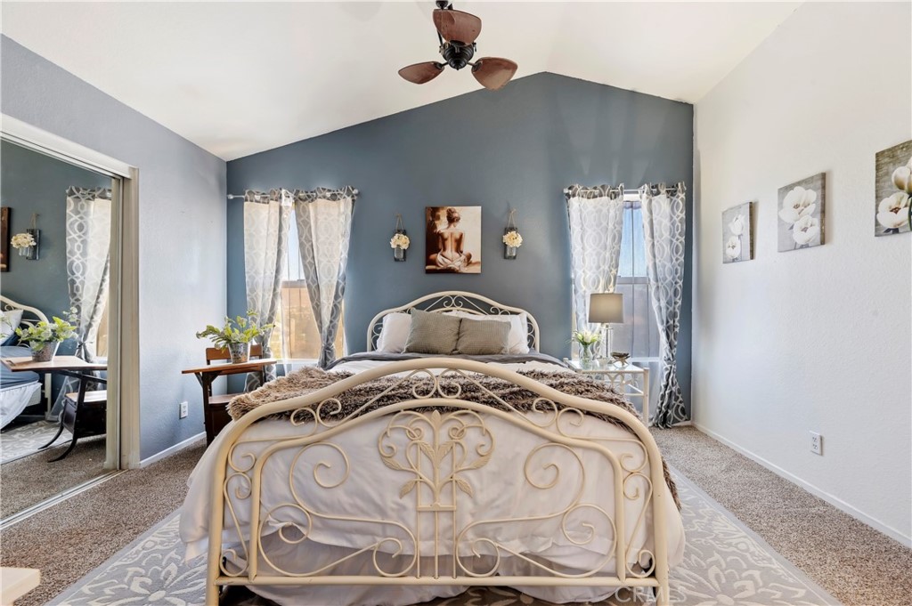 4144 Shellicia Circle Riverside, CA 92509 - Photo 27 of 33 a bedroom with a bed and window