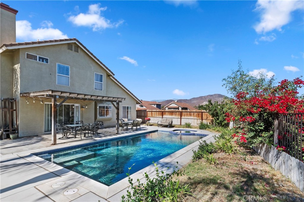 4144 Shellicia Circle Riverside, CA 92509 - Photo 30 of 33 a front view of a house with a yard