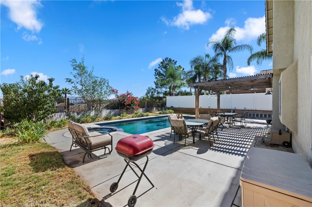 4144 Shellicia Circle Riverside, CA 92509 - Photo 31 of 33 a view of a chairs and tables in the patio