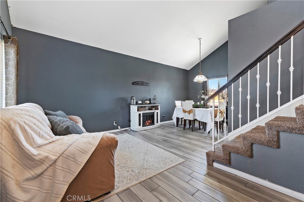 4144 Shellicia Circle Riverside, CA 92509 - Photo 6 of 33 a bedroom with furniture and a large window