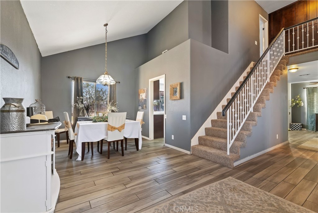 4144 Shellicia Circle Riverside, CA 92509 - Photo 8 of 33 a view of a dining room with furniture entryway and wooden floor