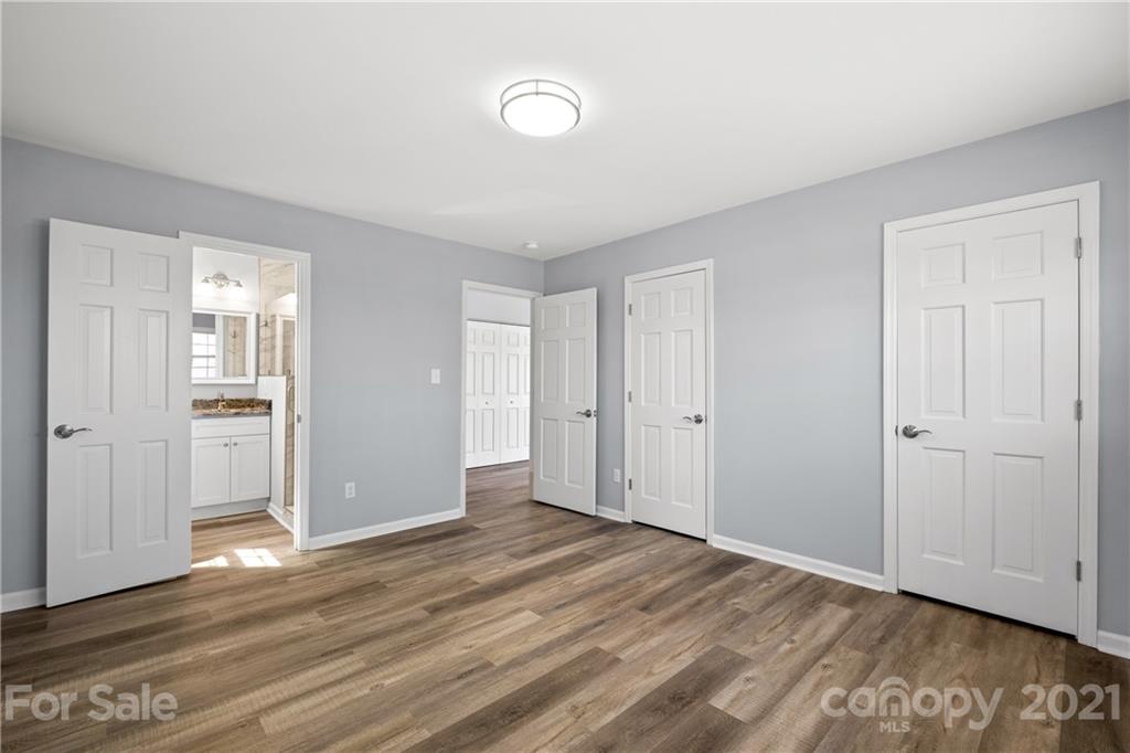 955 Potneck Road Salisbury, NC 28147 - Photo 12 of 28 a view of an empty room and wooden floor