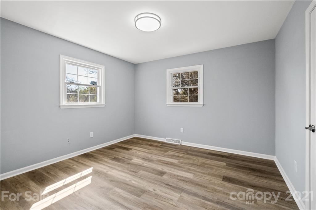 955 Potneck Road Salisbury, NC 28147 - Photo 17 of 28 a view of a room with wooden floor and window