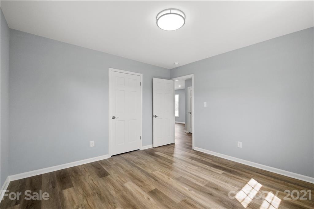 955 Potneck Road Salisbury, NC 28147 - Photo 18 of 28 a view of room with window and wooden floor