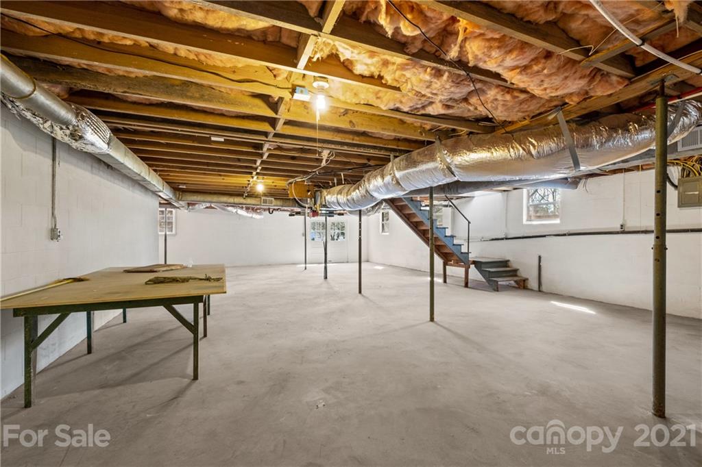 955 Potneck Road Salisbury, NC 28147 - Photo 21 of 28 a view of an empty room with wooden stairs