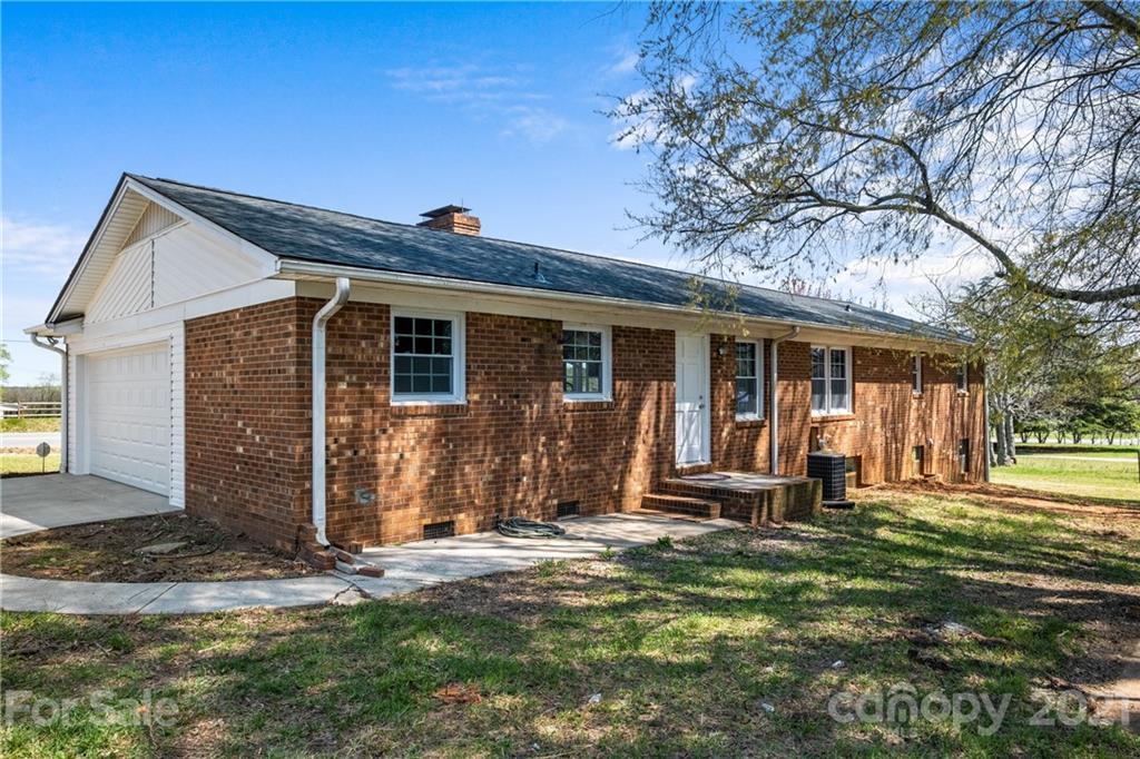 955 Potneck Road Salisbury, NC 28147 - Photo 25 of 28 a front view of a house with a yard