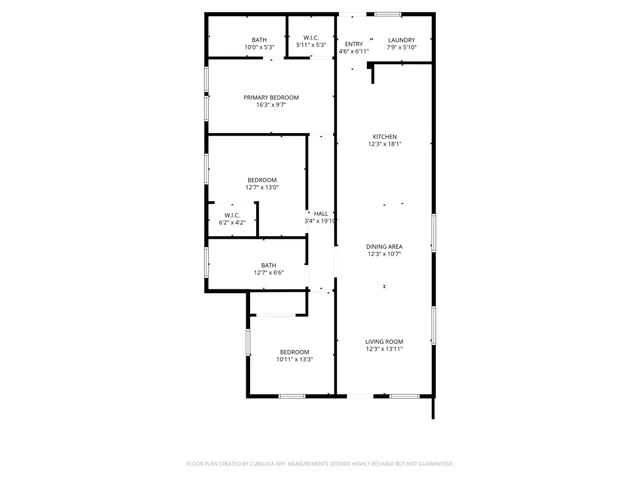 a picture of a bench in front of a wall