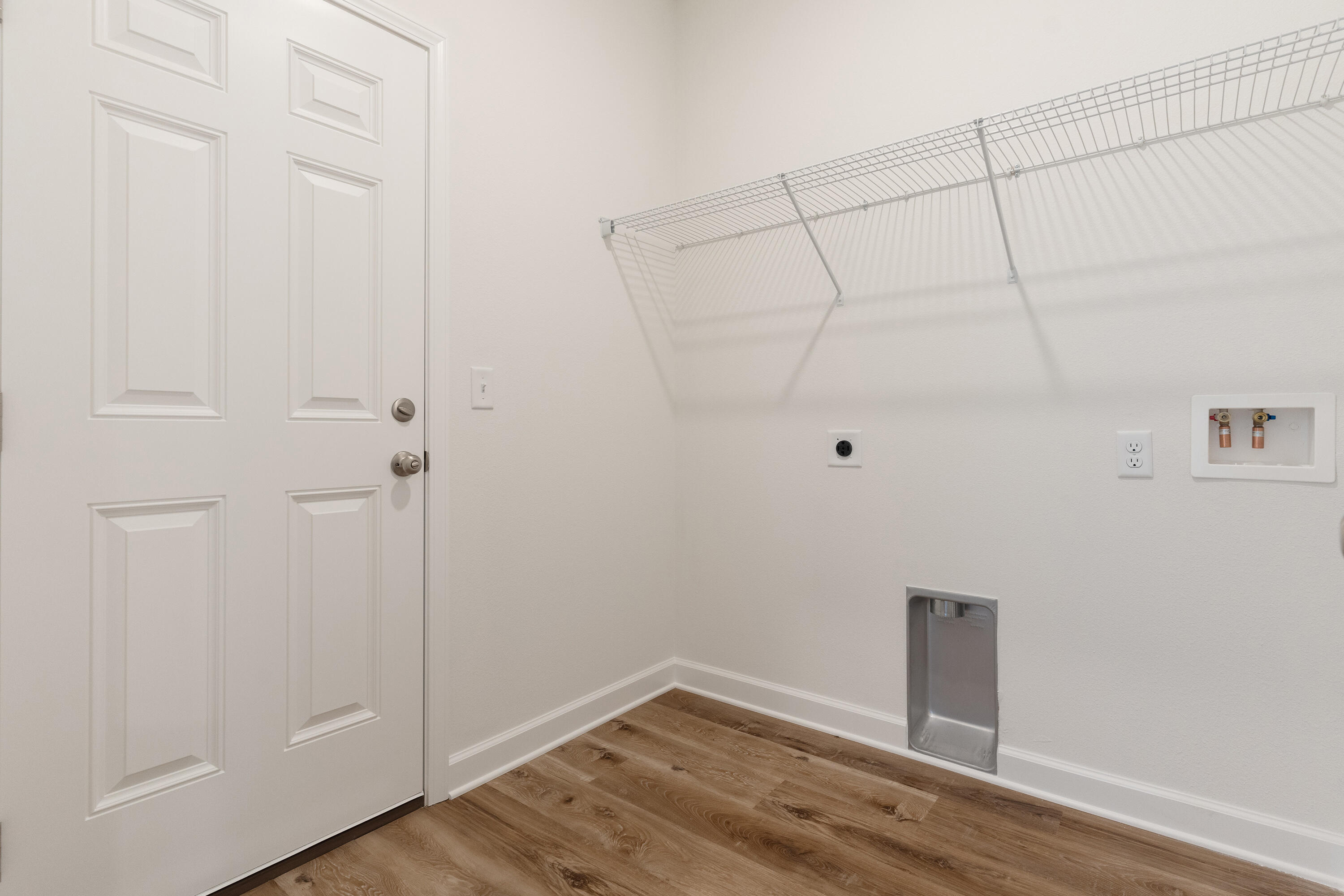 3202 Oxmore Drive Crestview, FL 32539 - Photo 18 of 20 a view of a room with wooden floor