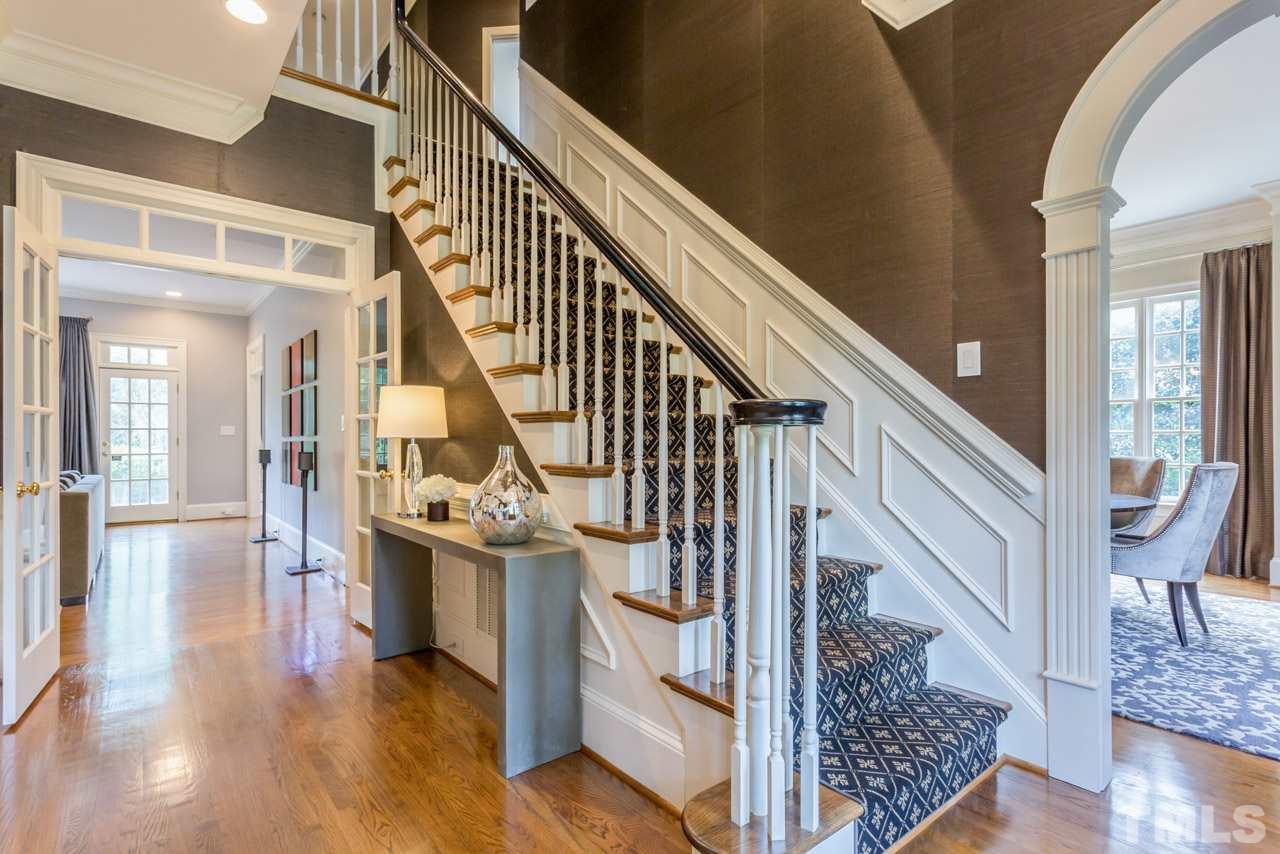 1916 Banbury Road Raleigh, NC 27608 - Photo 3 of 25 a view of entryway and hall with wooden floor